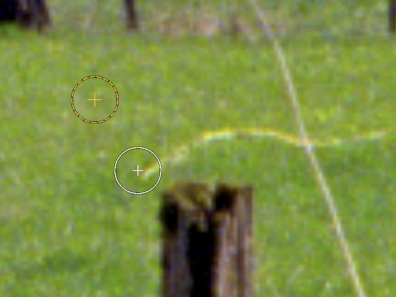 The clone stamp in NegBreaker: a source ring and a destination ring being moved across the frame